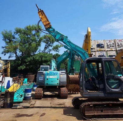 Graafmachine tunnelarm te koop met bak / breekhamer